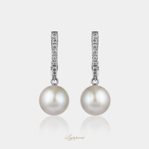 Witgoud met diamant en grijze parel
