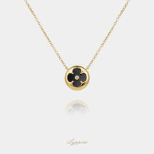 Geelgoud met onyx en diamant